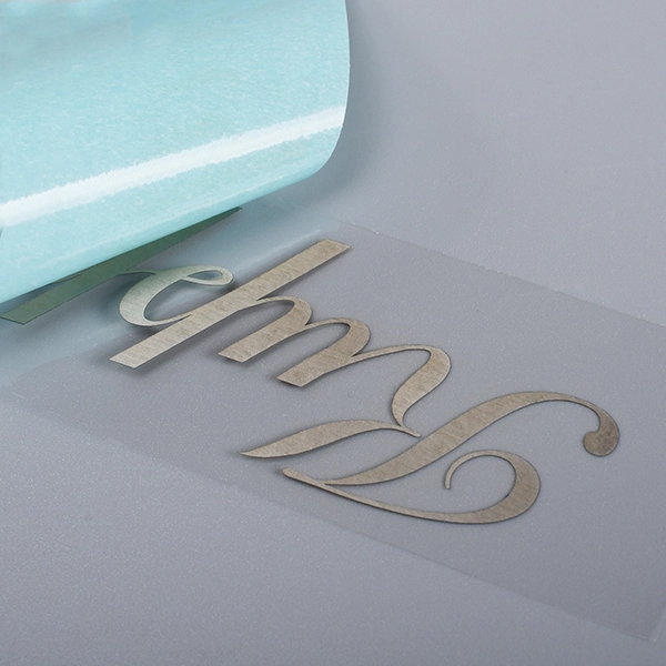 Adesivo con logo in nichel