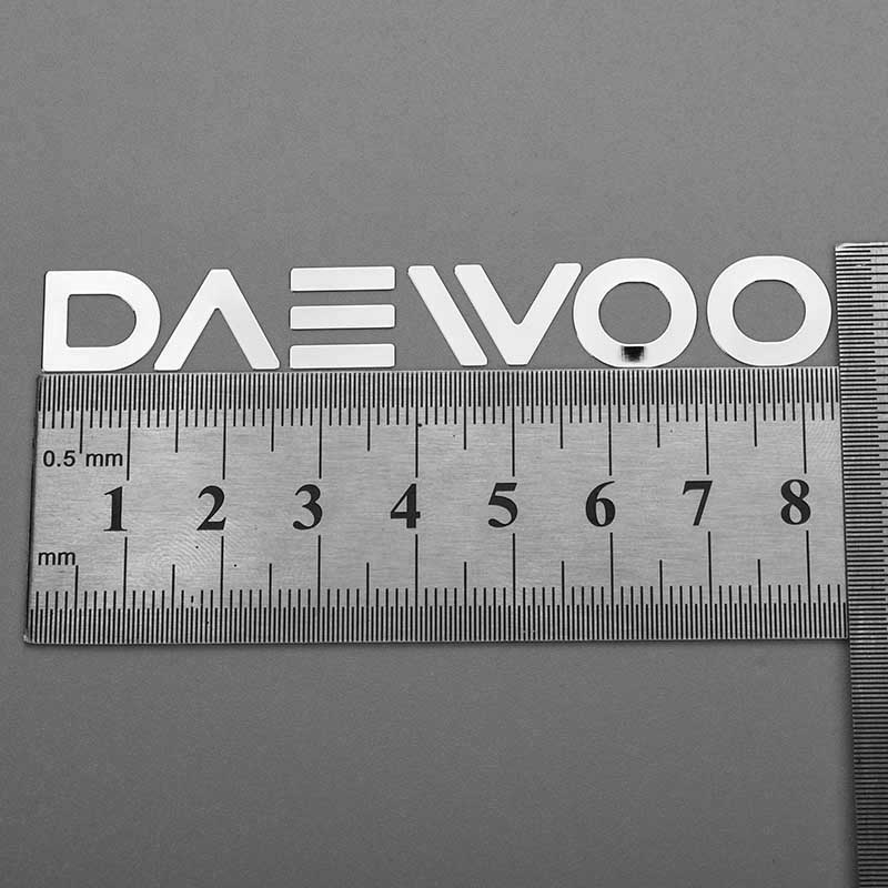 Logo adesivo in metallo con trasferimento elettroformato