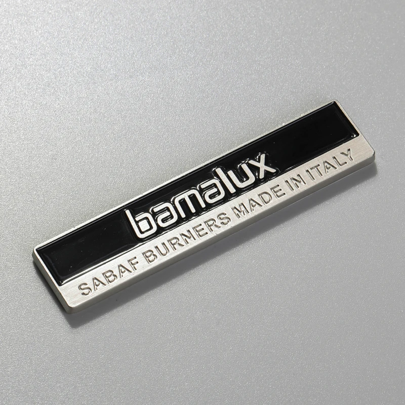 Badge in zinco cromato per lavatrice